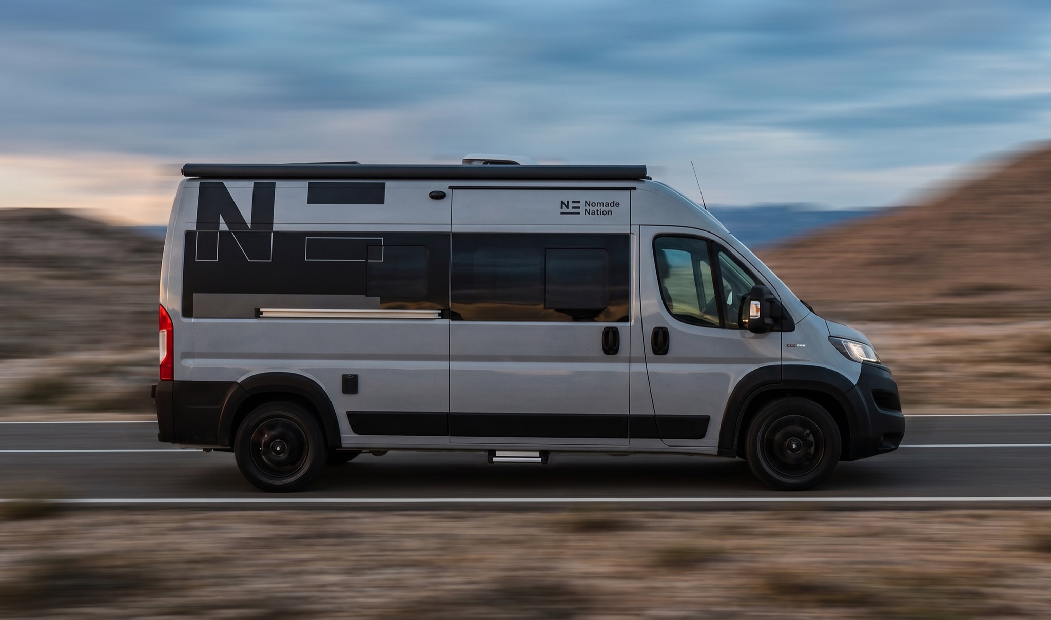 Camper Space driving on a mountain road