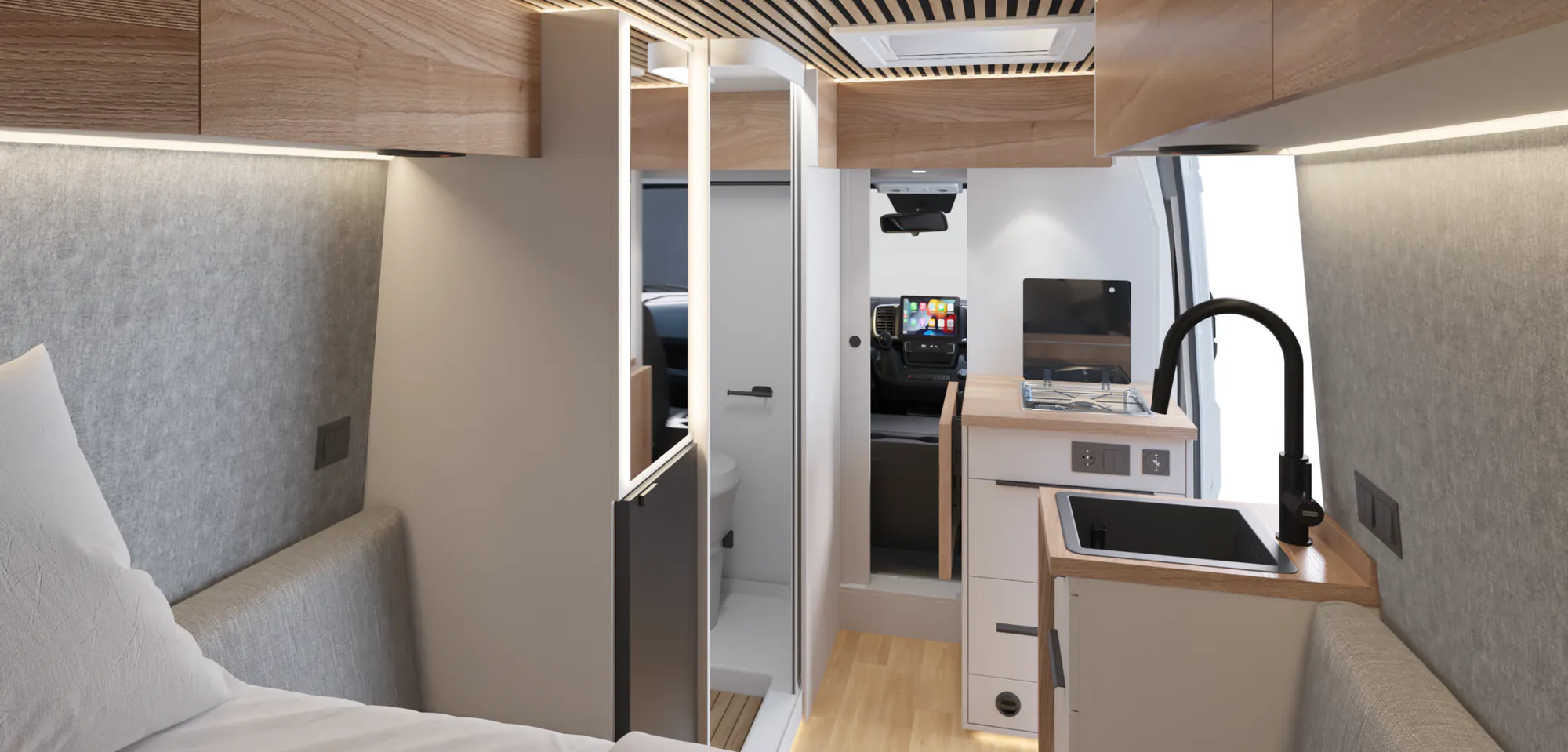 Interior de la Neo S amb mobiliari blanc i taulells efecte fusta